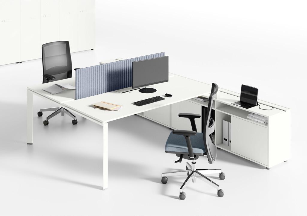 Spacious office layout with functional tables and comfortable chairs.